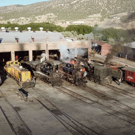 photo of the nnry yard, sun hitting the trains